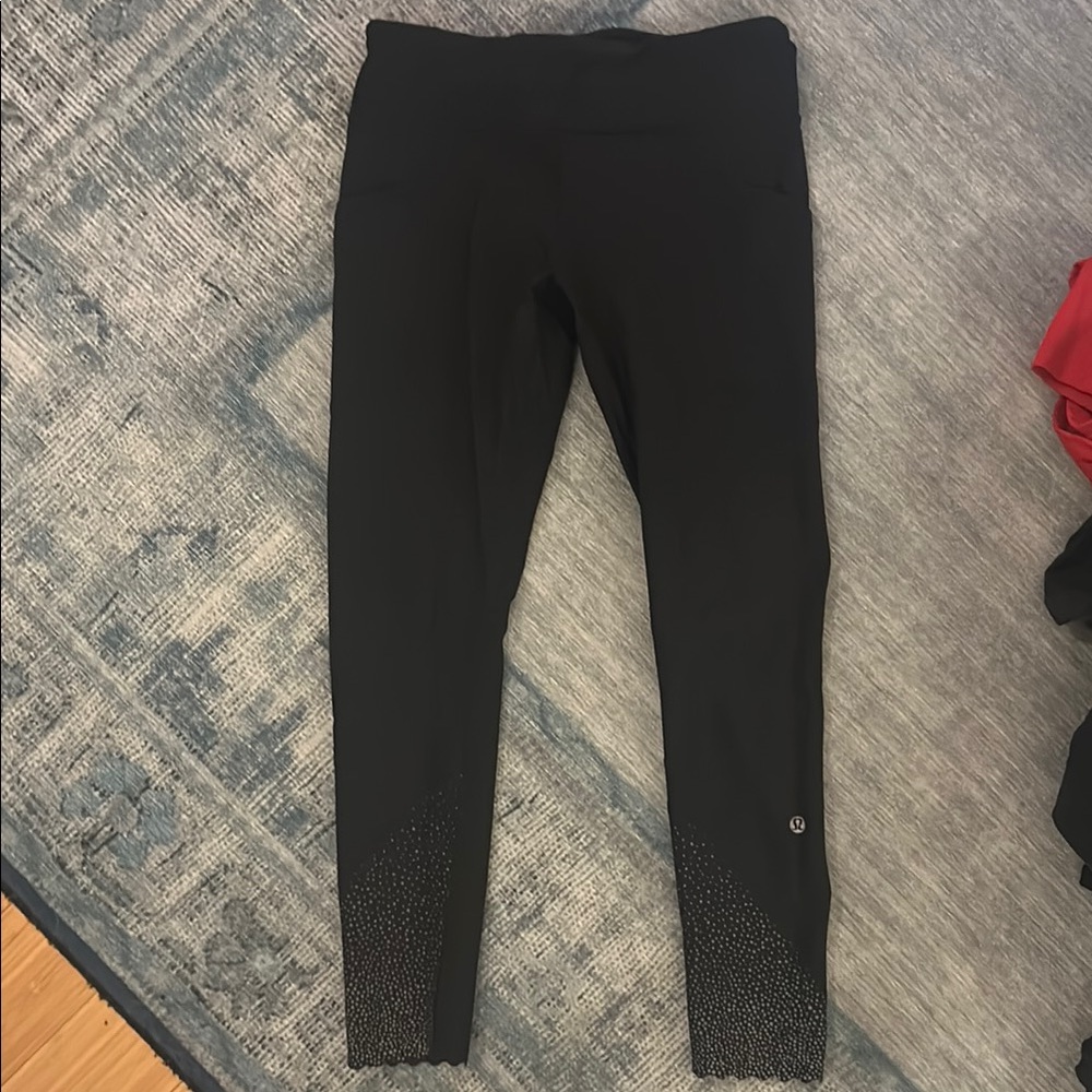 Lululemon Black Luxtreme Leggings. 7/8 length. Reflective detail.